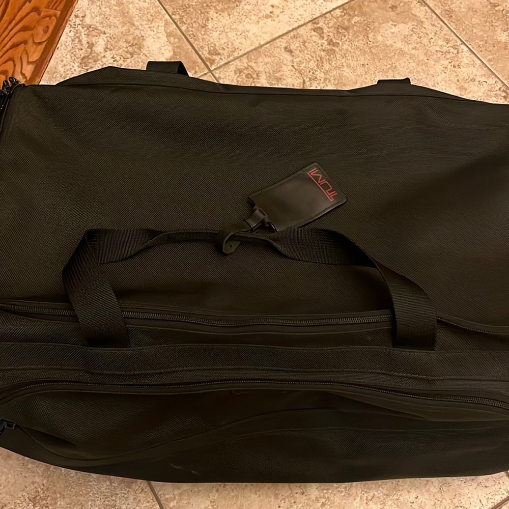 Tumi duffle luggage with wheels